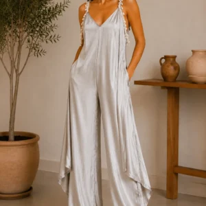 Flowing satin jumpsuit with embellished straps