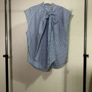 Striped blouse with bow